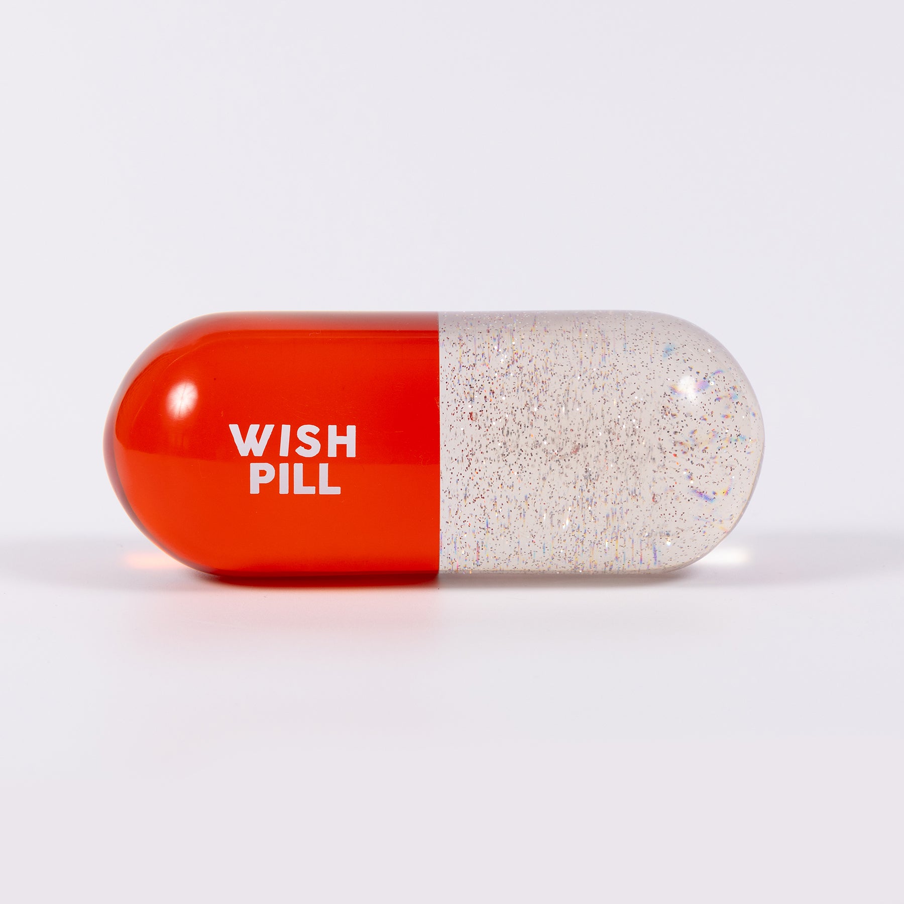 escultura glitter pill - wish