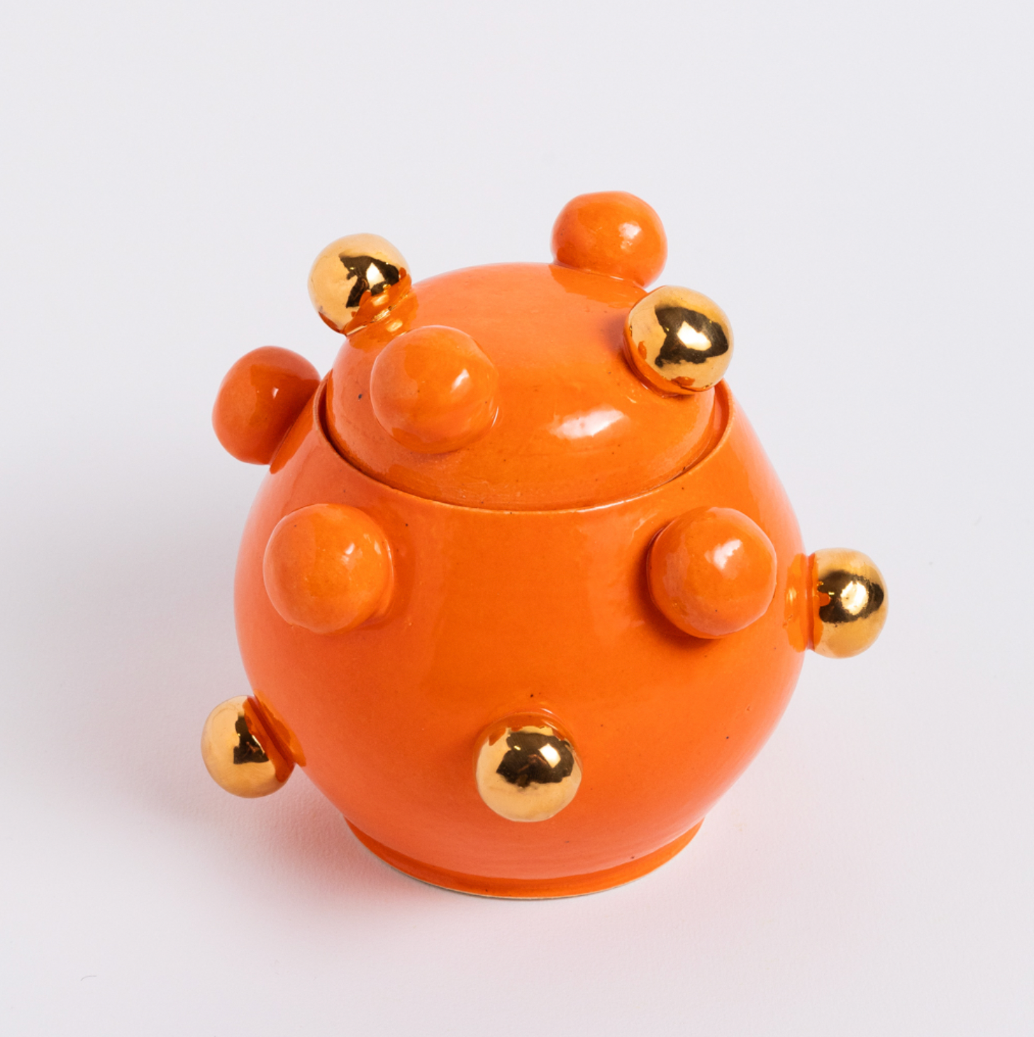 caixinha bruxelas ouro alternado laranja