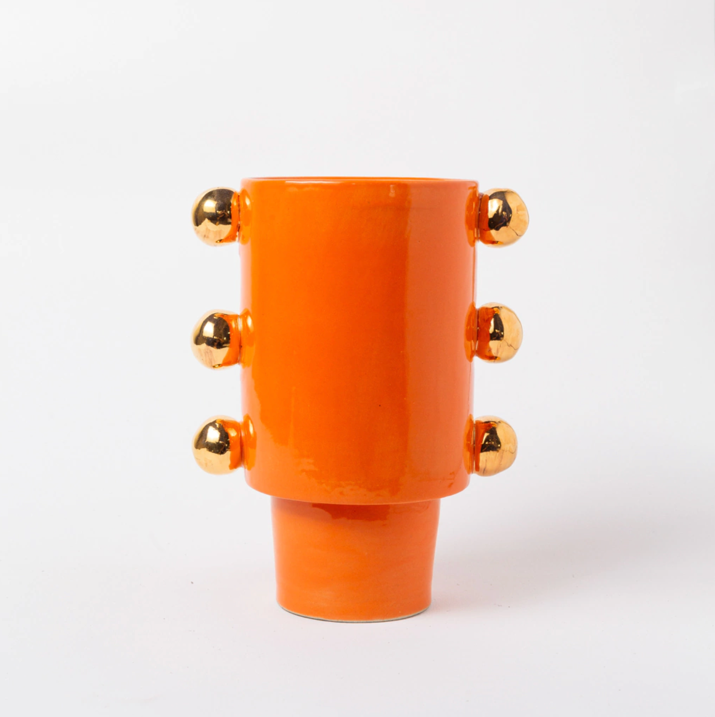 vaso giu laranja com ouro